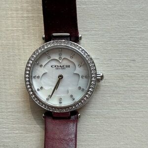 Coach Silver and Maroon Crystal Watch.  In fair condition needs a battery.